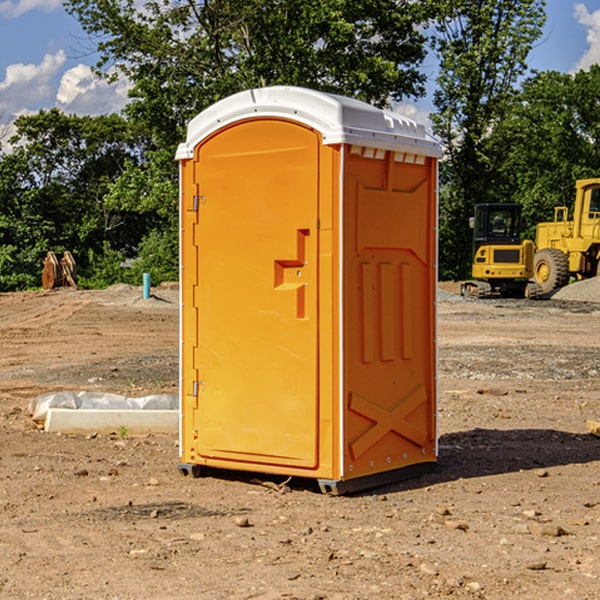 how often are the portable restrooms cleaned and serviced during a rental period in Clayton NM